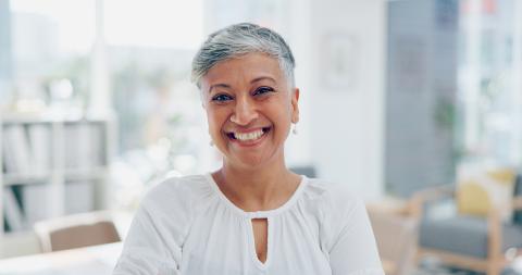 Photo of a woman with white hair smiling