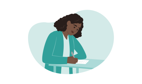 Cartoon image of a woman sat at a desk